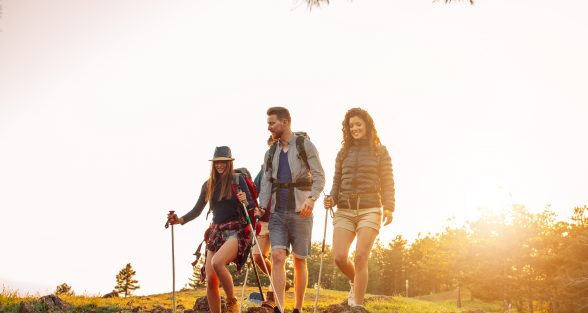 Shot of a group of friends hiking in the mountains